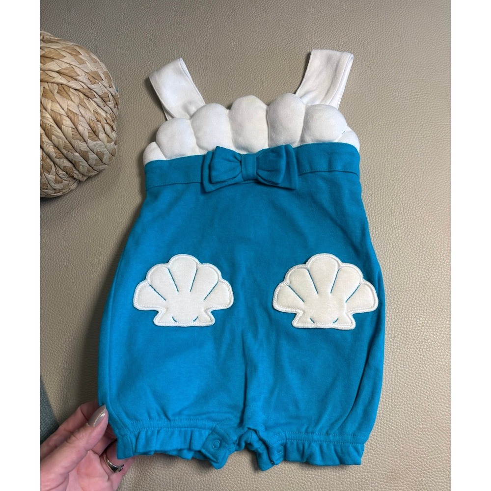 Baby girl size 3-6 months Gymboree Blue Shell romper with bow. EUC. 100% cotton.